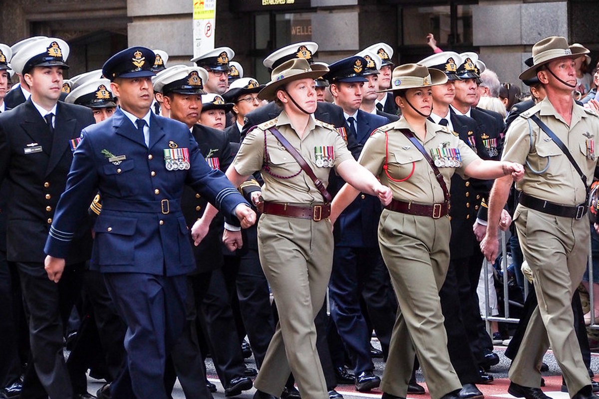 Man bites police officer, two men arrested during Anzac Day march