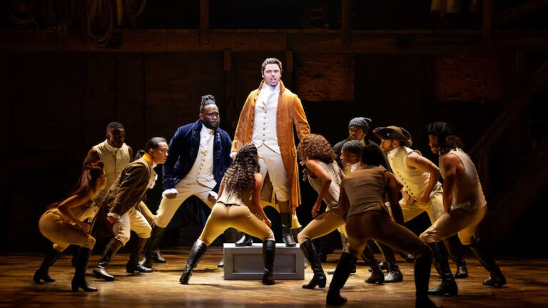 Jason Arrow centre as Alexander Hamilton in the Australian production. Credit Michael Cassel GroupDaniel Boud 1 768x432