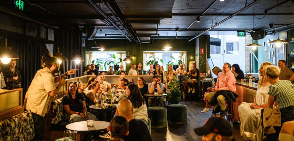 “A Pub Crawl With A Punch Line”: Sydney Comedy Festival Brings A Queer Comedy Crawl To Oxford Street