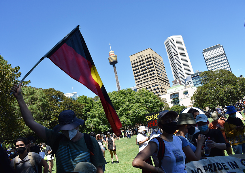 Defiant Invasion Day protesters gather in the Domain