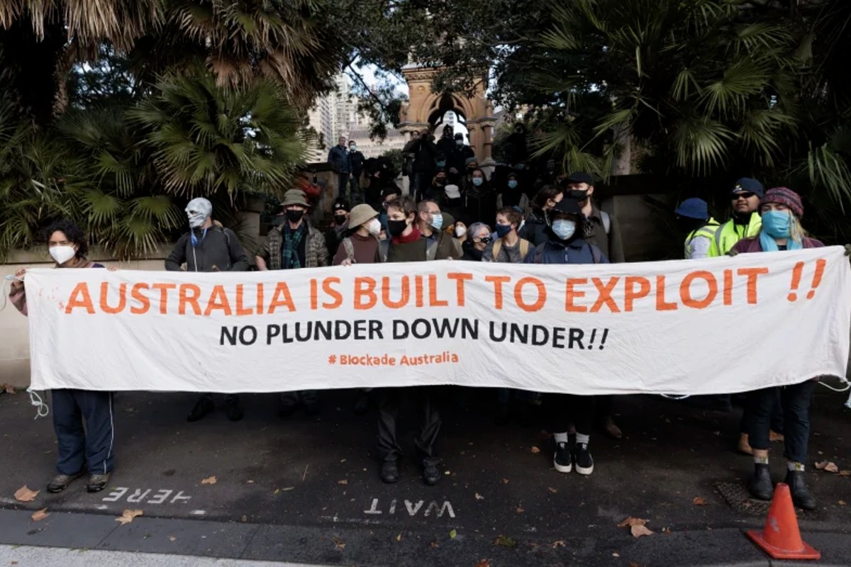 Another climate protester charged as Blockade Australia says police responded “violently”