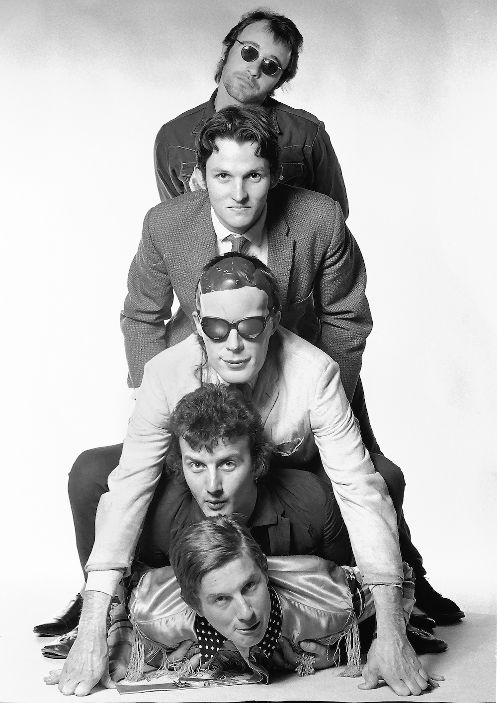 Mental As Anything band members in vertical line up